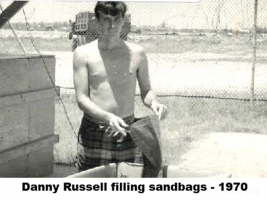 Danny Russell filling sandbags - 1970 DNG-003